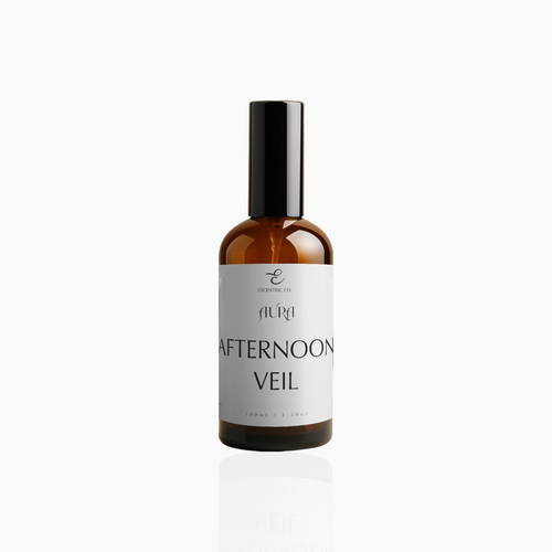 100ml Afternoon Veil fragrance mist in amber glass bottle with black cap and soft grey-white label, photographed on white background