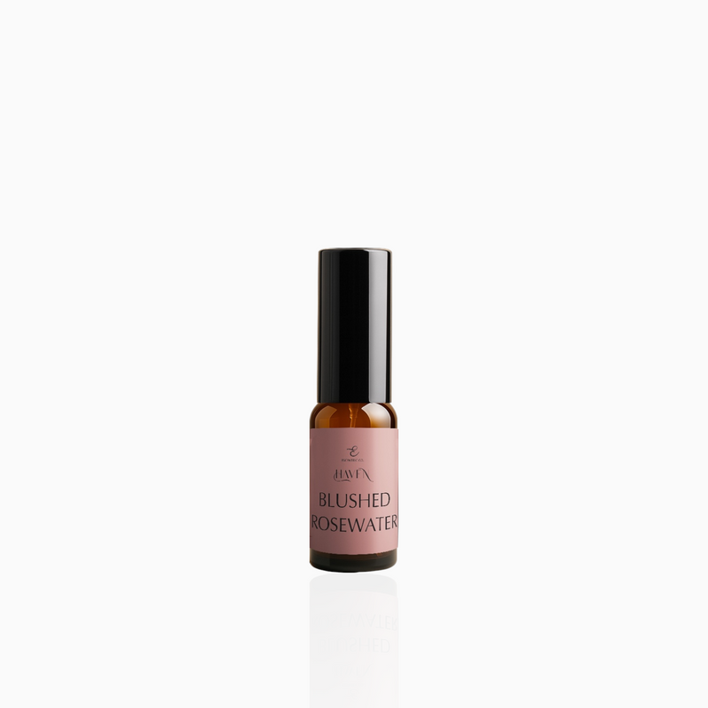15ml Blushed Rosewater fragrance mist in amber glass bottle with black cap and dusty rose label, photographed on white background