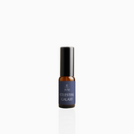 15ml Celestial Galaxy fragrance mist in amber glass bottle with black cap and deep indigo label, photographed on white background