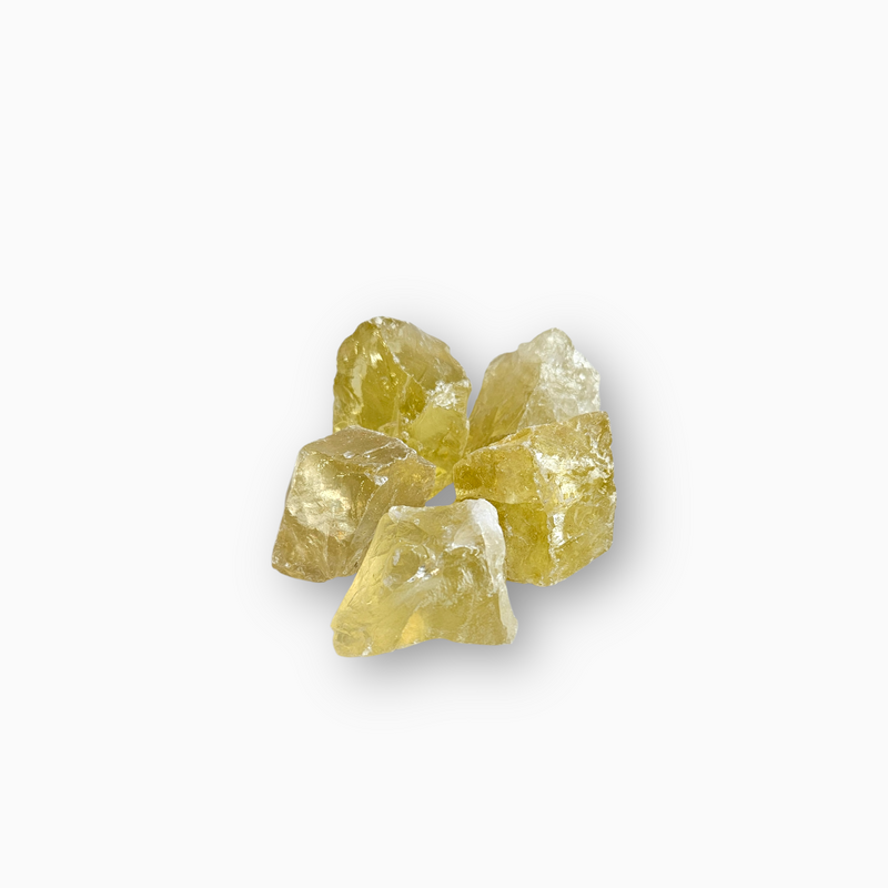 Cluster of raw Citrine crystals in golden yellow hues with semi-transparent, glossy surfaces, displayed against a clean white background.
