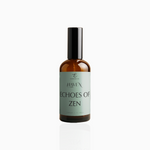 100ml Echoes of Zen fragrance mist in amber glass bottle with black cap and sage green label, photographed on white background