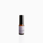 15ml In Lavender Silence fragrance mist in amber glass bottle with black cap and soft lavender label, photographed on white background