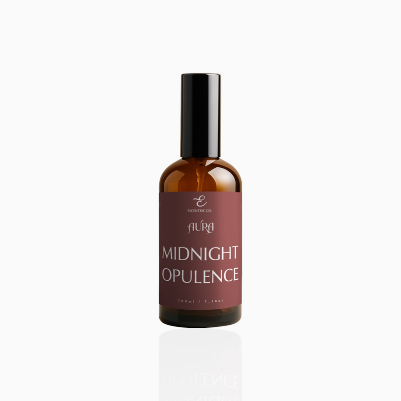 100ml Midnight Opulence fragrance mist in amber glass bottle with black cap and deep crimson label, photographed on white background