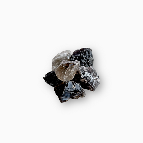 Cluster of raw Smokey Quartz crystals in translucent grey to deep brown tones, showcasing natural textures and earthy shimmer against a white background.
