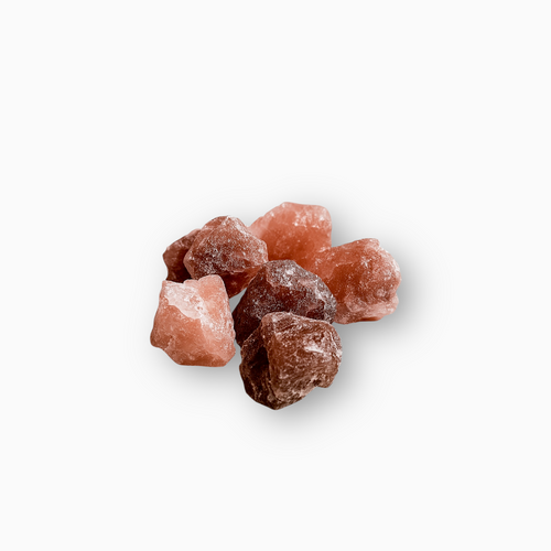 Raw Strawberry Quartz crystals in shades of soft pink to deep rose, arranged in a small cluster on a clean white background.