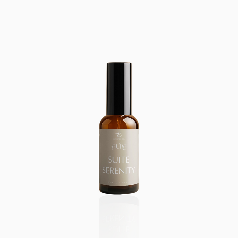 50ml Suite Serenity fragrance mist in amber glass bottle with black cap and soft taupe label, photographed on white background