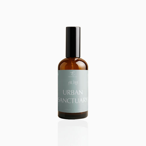 100ml Urban Sanctuary fragrance mist in amber glass bottle with black cap and muted-aqua label, photographed on white background